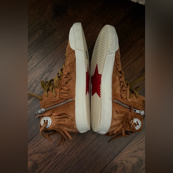 The sneakers are the ASH Marlow Fringe Lace Up High Top Sneakers. Size 38 - Picture 11 of 16